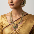 Gold-plated Lakshmi temple necklace set with pink beads, pearls and CZ stones, flat-lay of full necklace and earrings