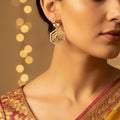 Hexagonal earrings with gold accents 