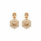 Gold-tone champagne hexagonal statement earrings, flat-lay pair showing pave halo detailing