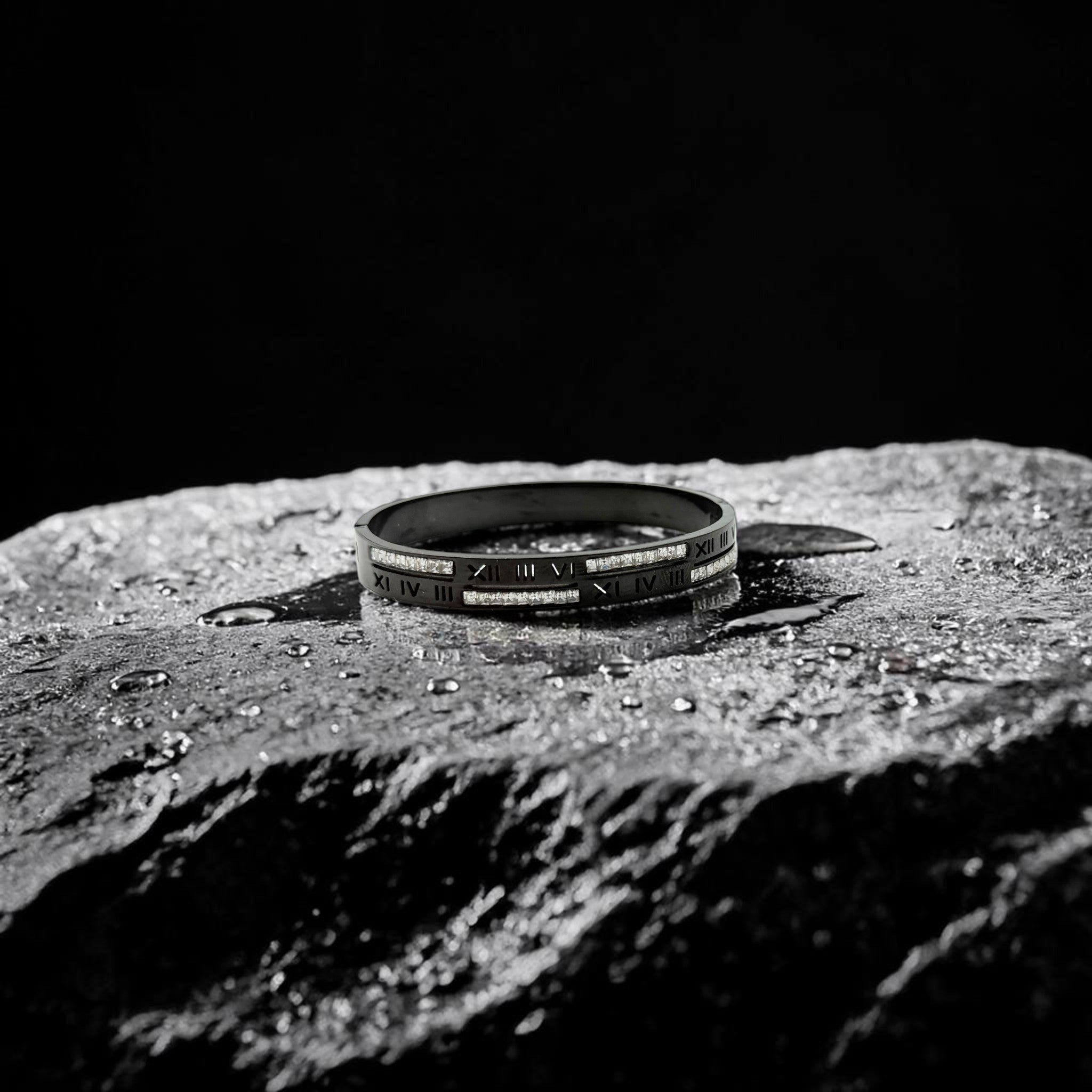 Bracelet with Roman numeral design on a textured surface
