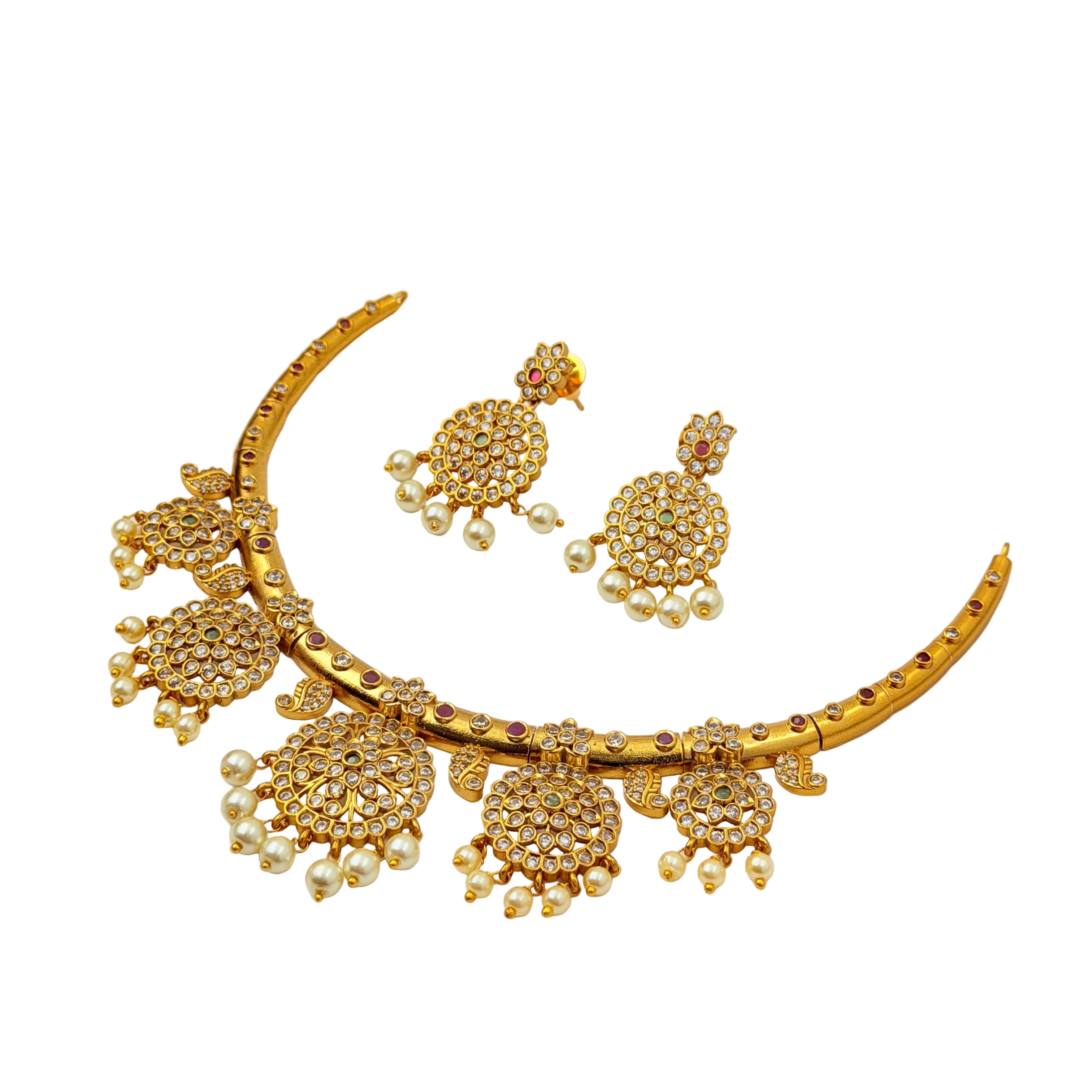 Gold necklace and earrings set on a white background
