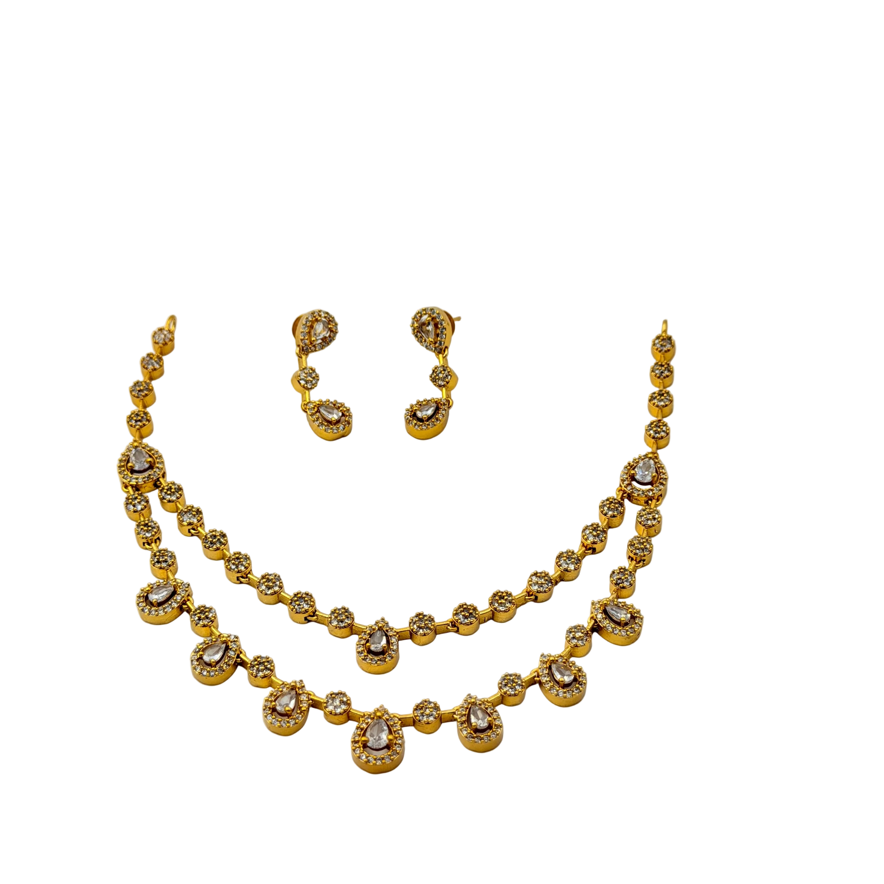 Gold necklace and earrings set on a white background