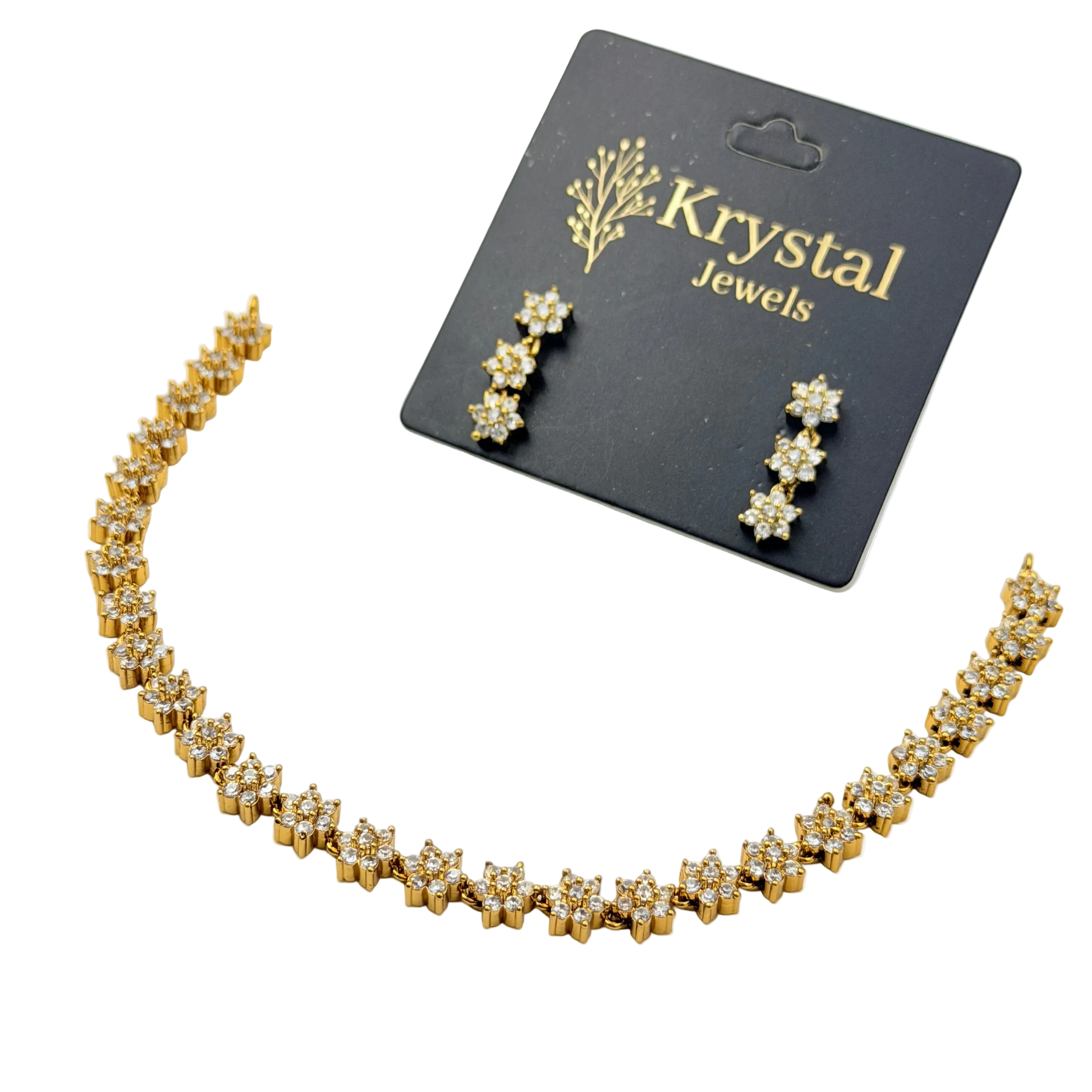Gold necklace and earrings set with 'Krystal Jewels' card on a white background