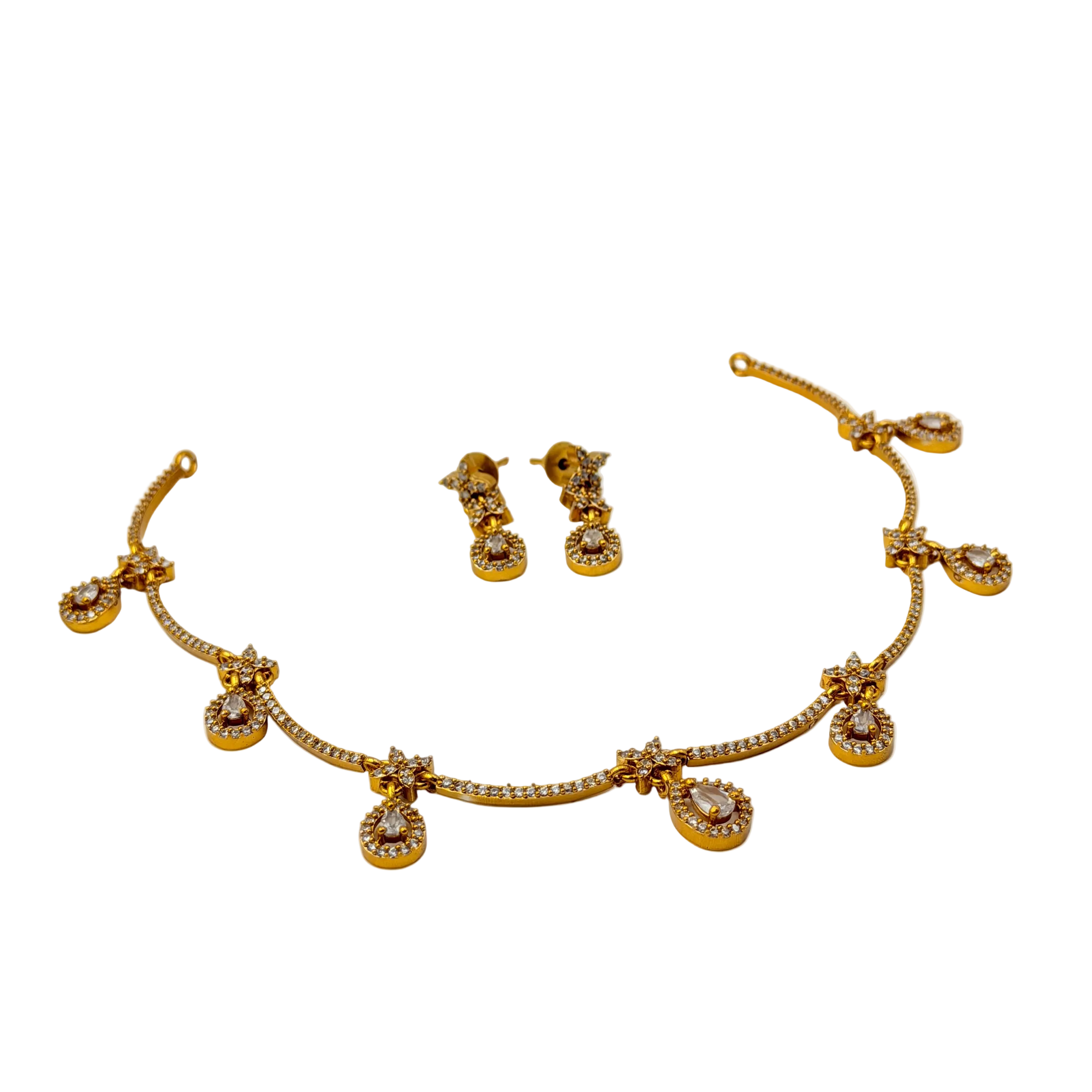 Gold necklace and earrings set on a white background