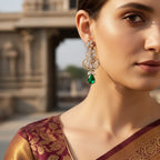 Gold earrings with green gemstones 