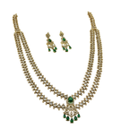 Jewelry set with necklace and earrings on a white background
