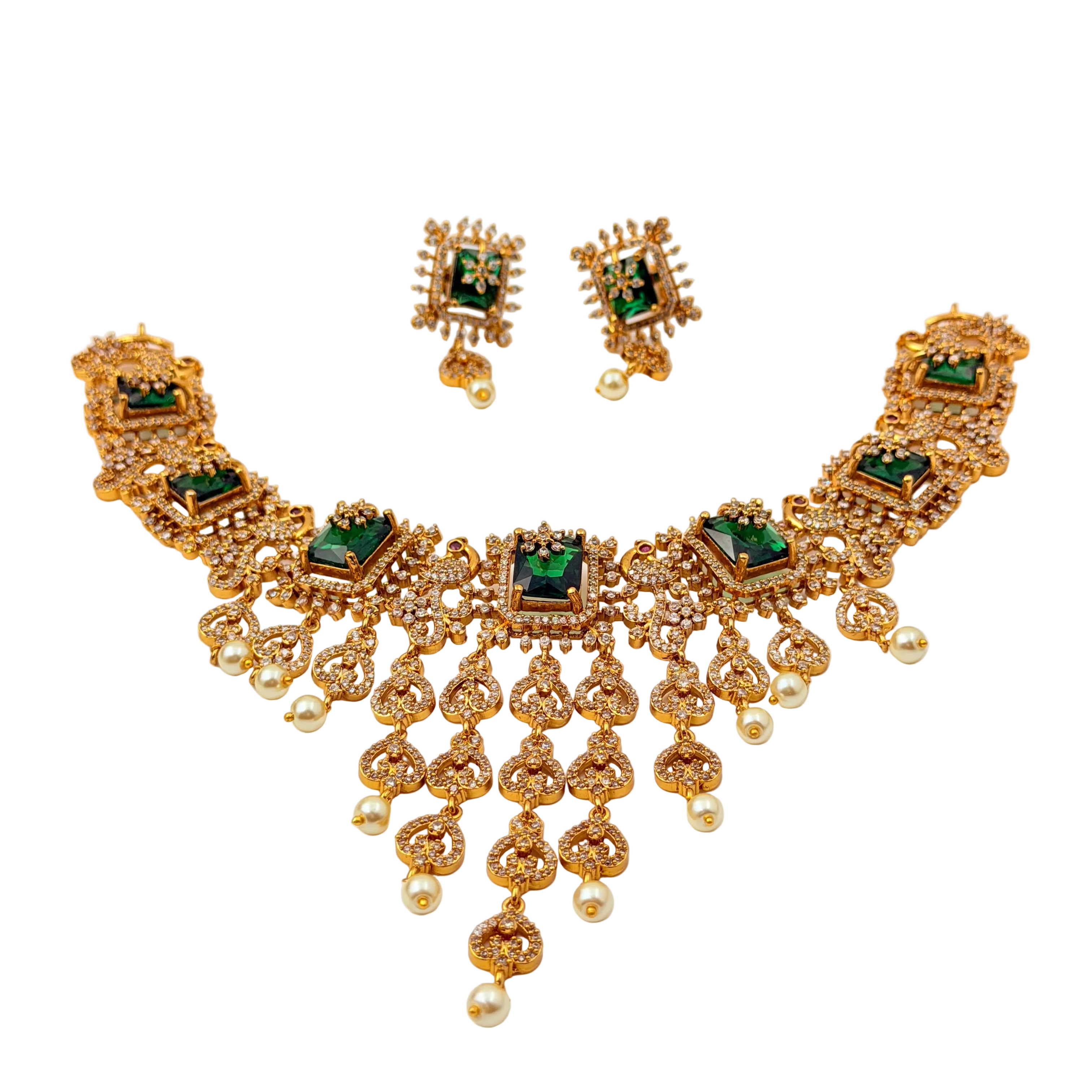 Gold necklace with green gemstones and matching earrings on a white background