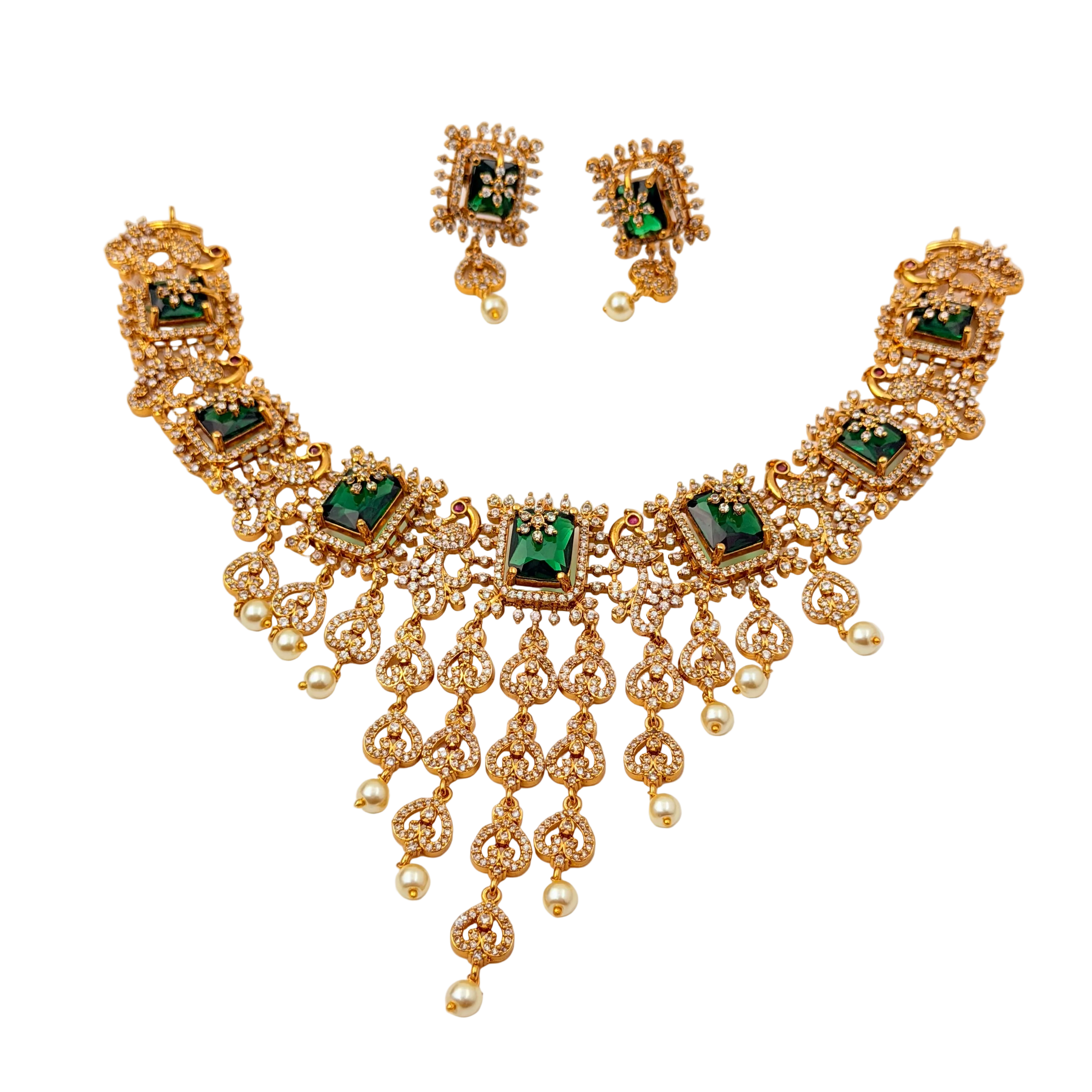 Gold necklace with green gemstones and matching earrings on a white background