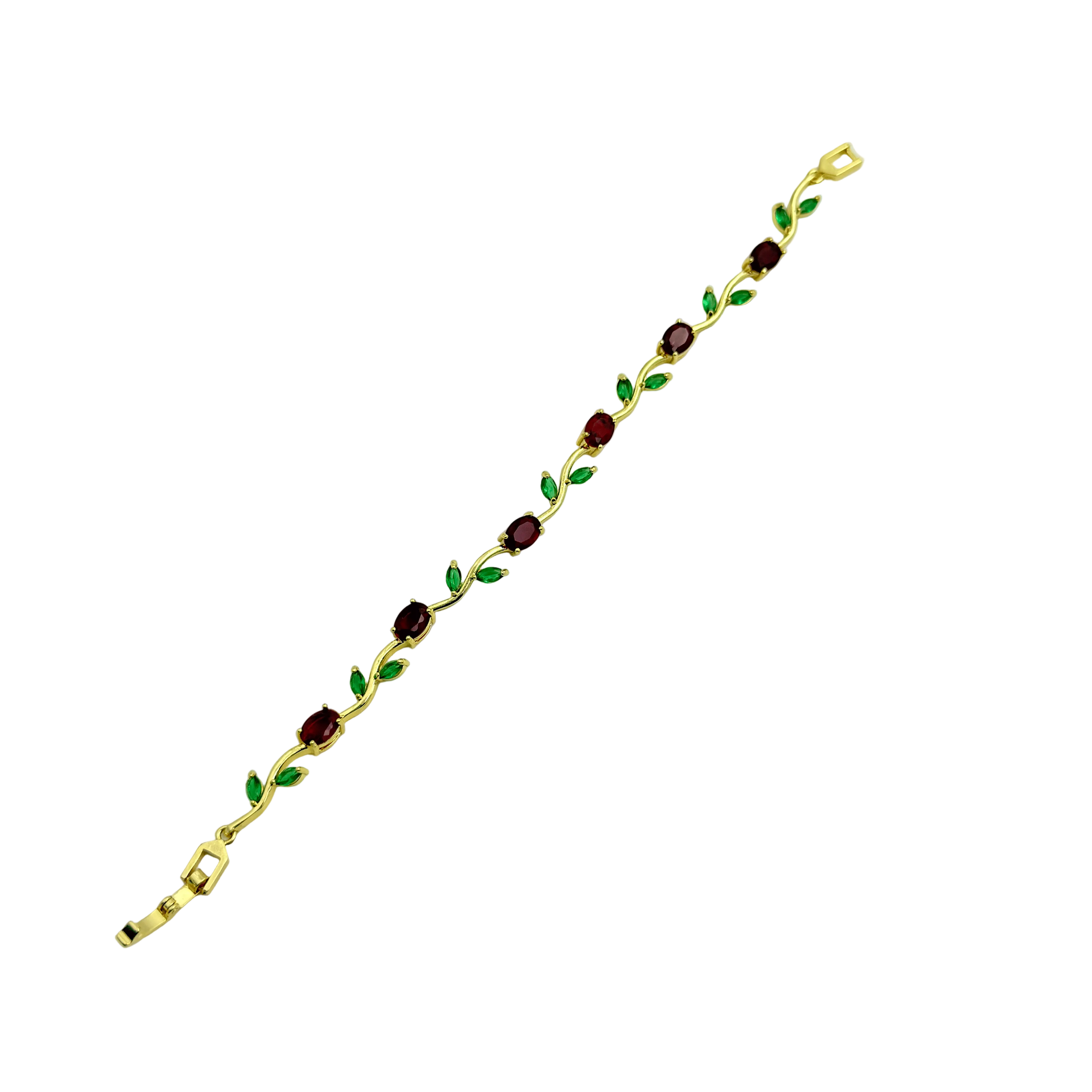 Gold bracelet with green and red gemstones on a white background