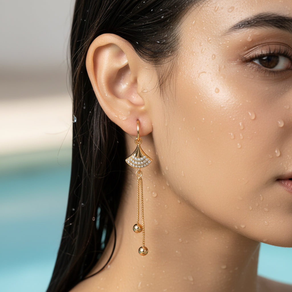 Gold Fan Motif Crystal Tassel Earrings