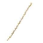 Gold bracelet with floral design on a white background