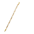 Gold bracelet with embedded stones on a transparent background