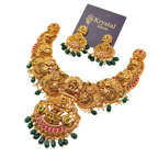Ornate gold necklace with green and red stones on a transparent background, branded 'Krystal Jewels'.