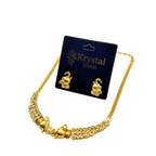 Gold necklace with elephant designs on a 'Krystal Jewels' card
