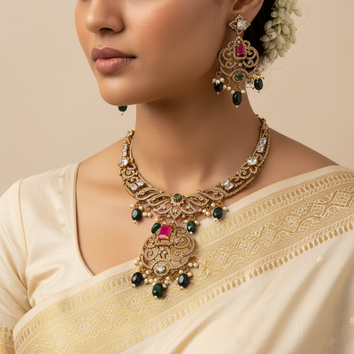 Woman wearing a gold necklace and earrings with a beige saree on a beige background