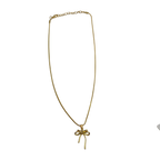 Gold-tone snake chain necklace with bowknot pendant, full flat-lay view showing extendable clasp
