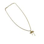 Gold-tone bowknot ribbon pendant with clear crystal center, flat-lay view of chain and clasp