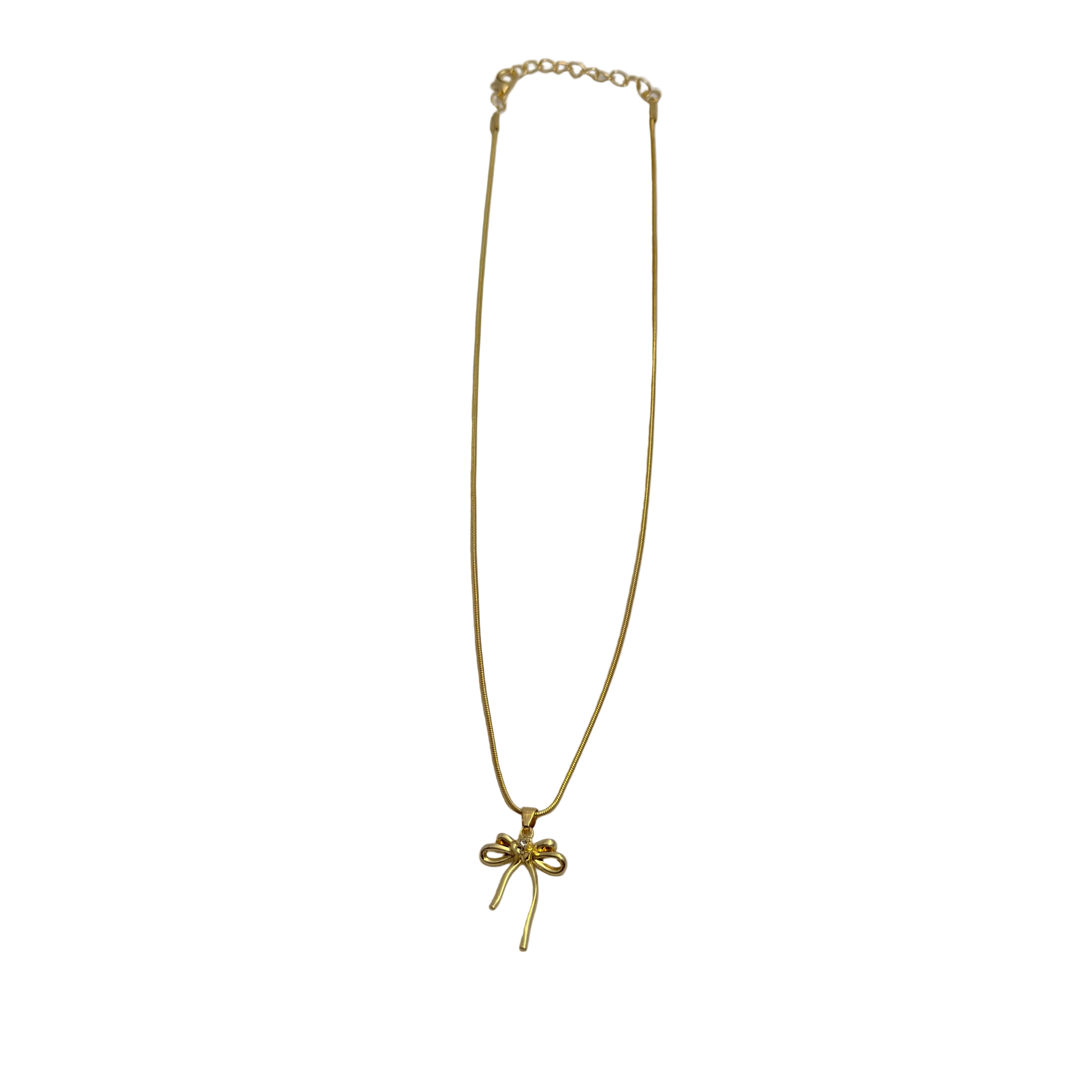 Gold-tone bowknot pendant necklace with clear crystal center, flat-lay view of chain and clasp