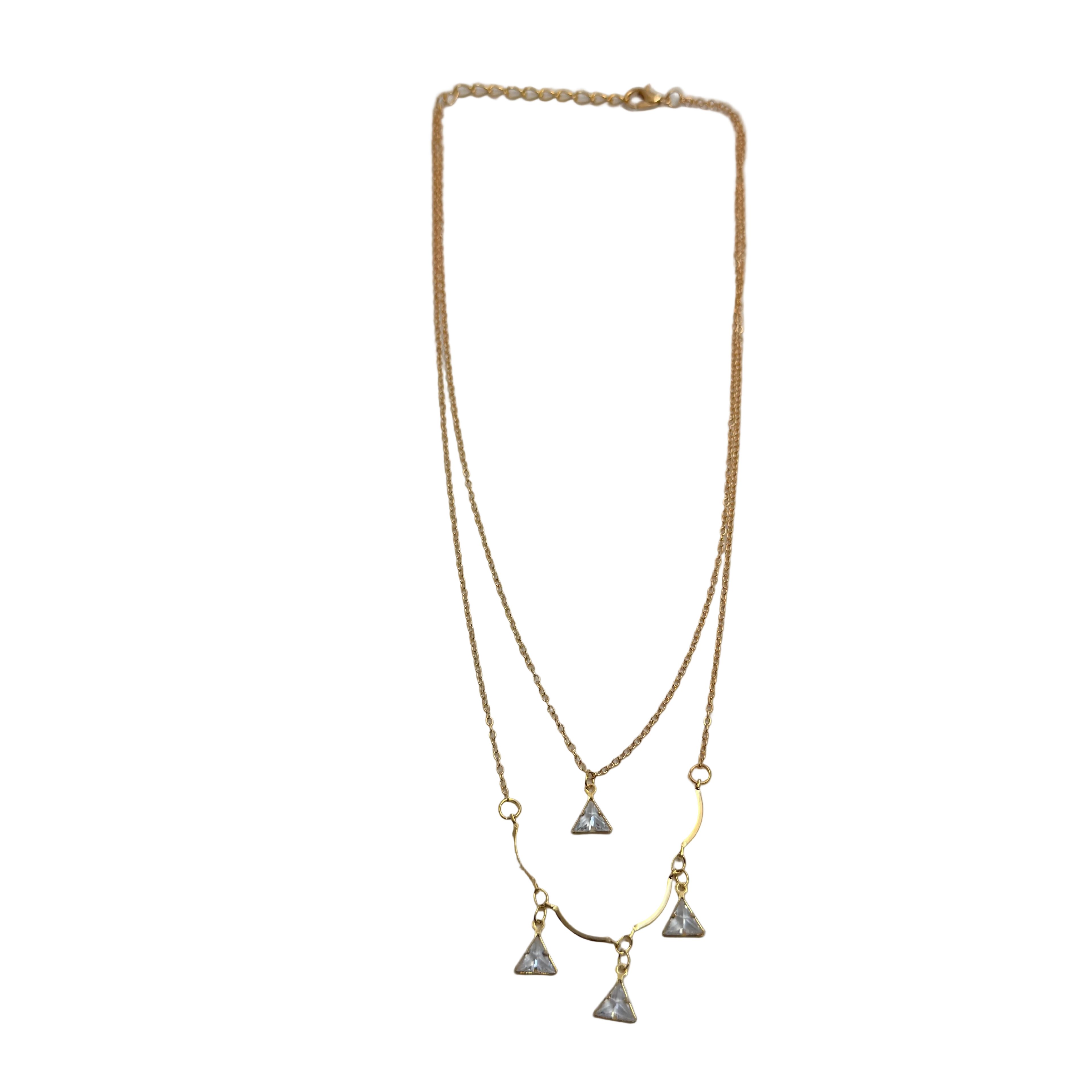 Gold-tone double-layered necklace with wavy bar and four trillion-cut crystal charms, flat lay on white background