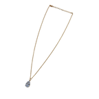 Gold-tone pendant necklace with pear-cut clear crystal solitaire, full flat-lay view