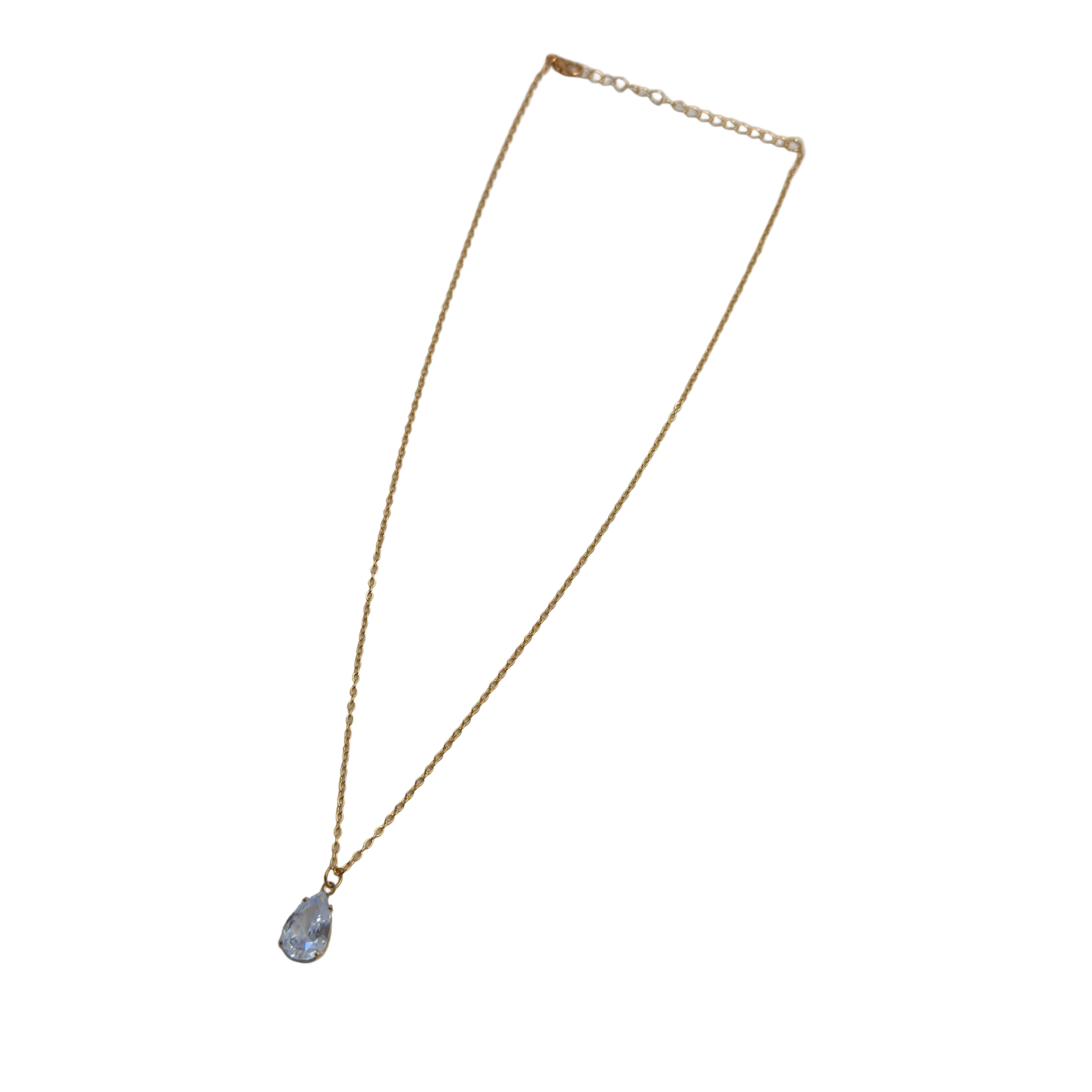 Gold-tone pendant necklace with pear-cut clear crystal solitaire, full flat-lay view