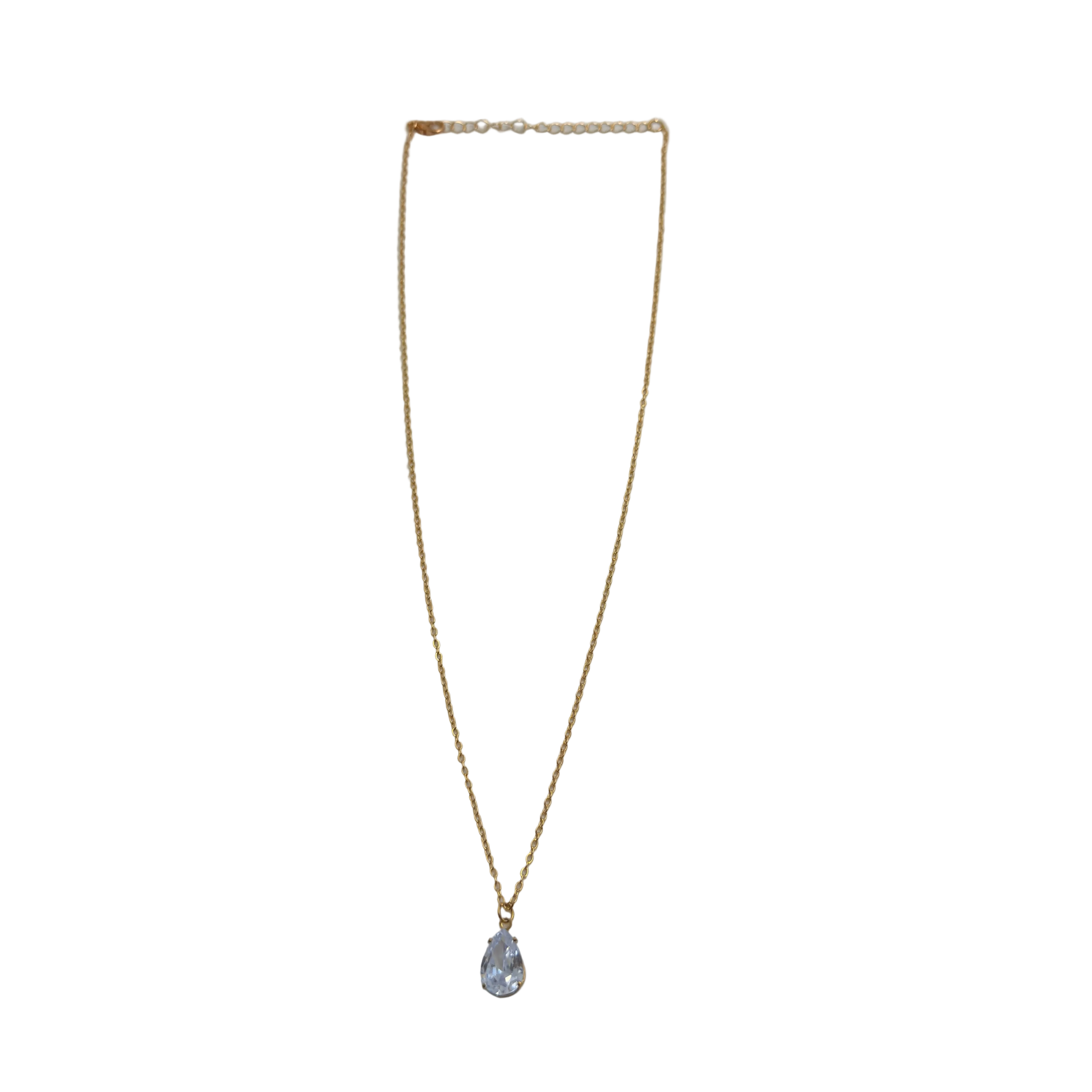 Gold-tone pendant necklace with pear-cut clear crystal solitaire, full flat-lay view