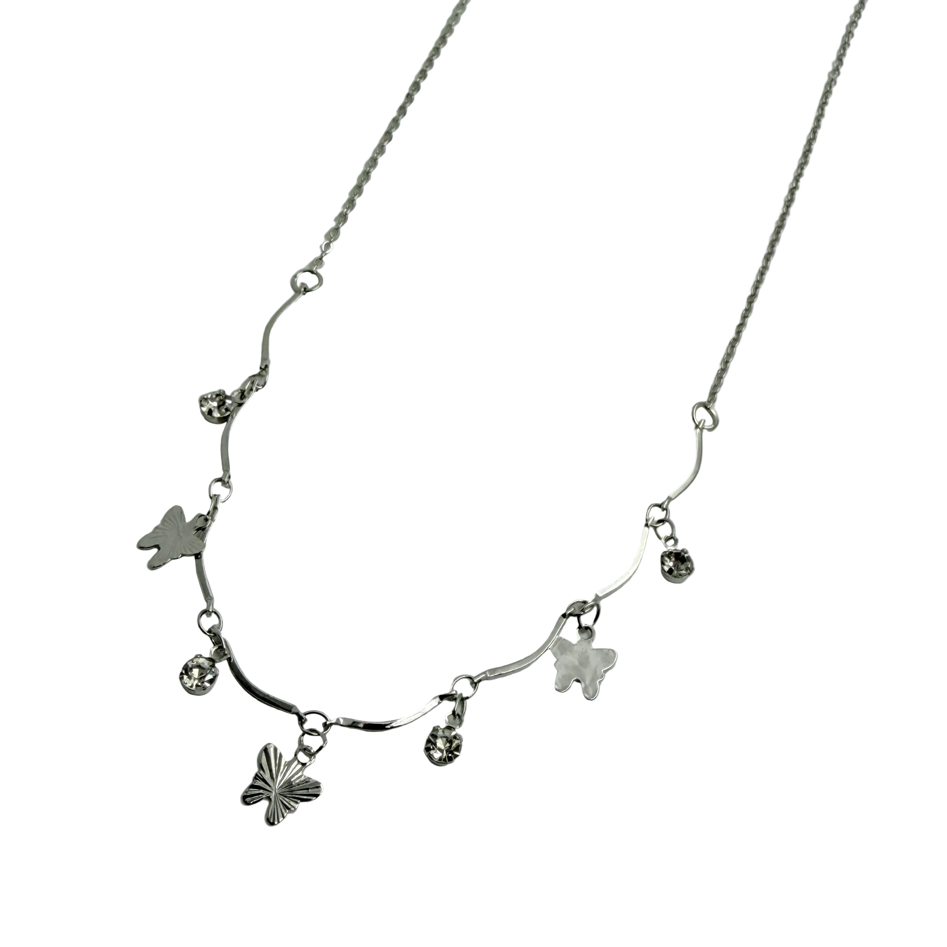 Polished silver butterfly charm necklace with wavy bar and crystal accents, close-up detail on black background
