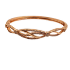 Rose gold-tone bangle bracelet with pave crystal split-helix design, flat-lay full view showing double-orbit silhouette