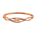 Rose gold-tone bangle bracelet with pave crystal split-helix design, close-up of hinge and crystal cluster detail