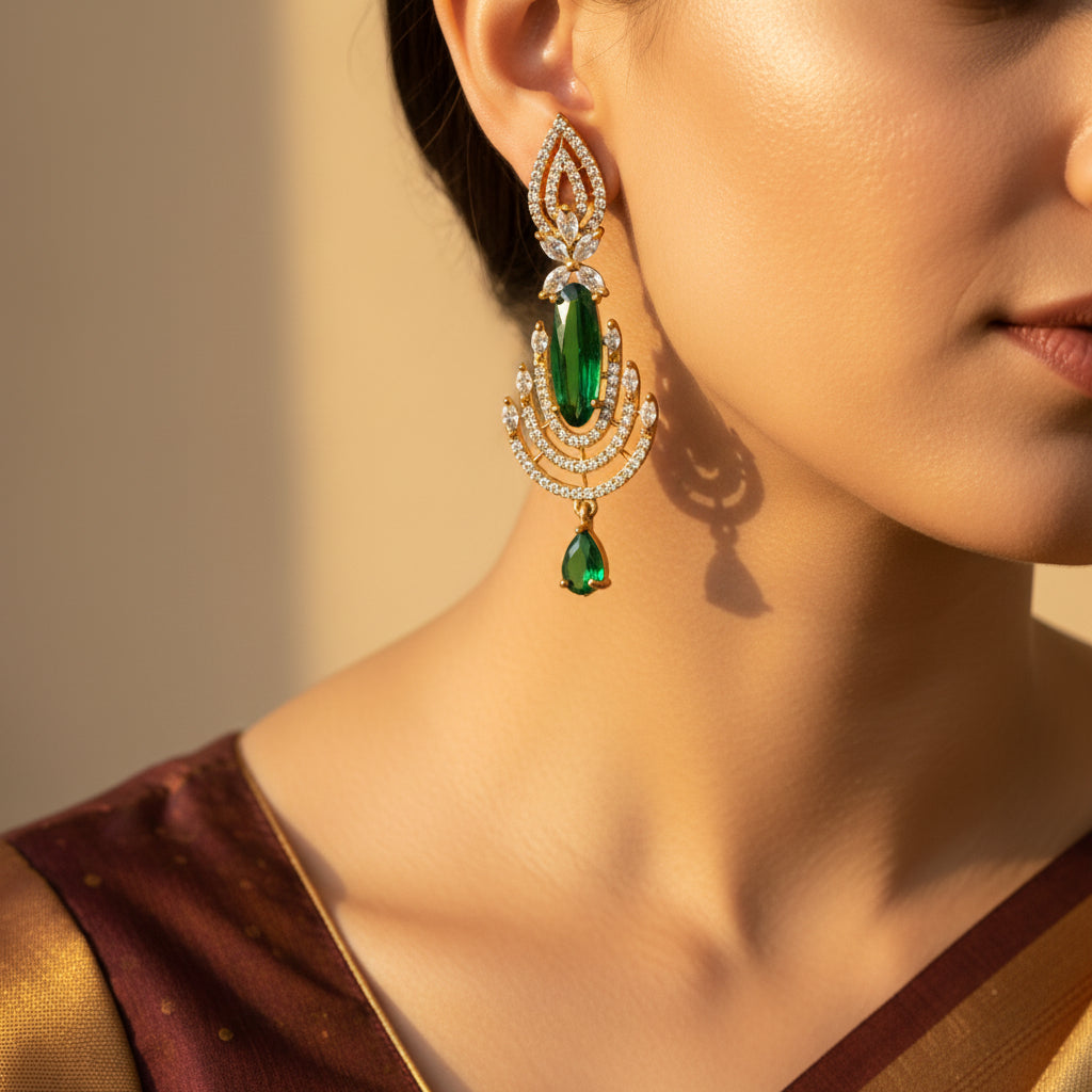 Green gemstone earrings with gold accents