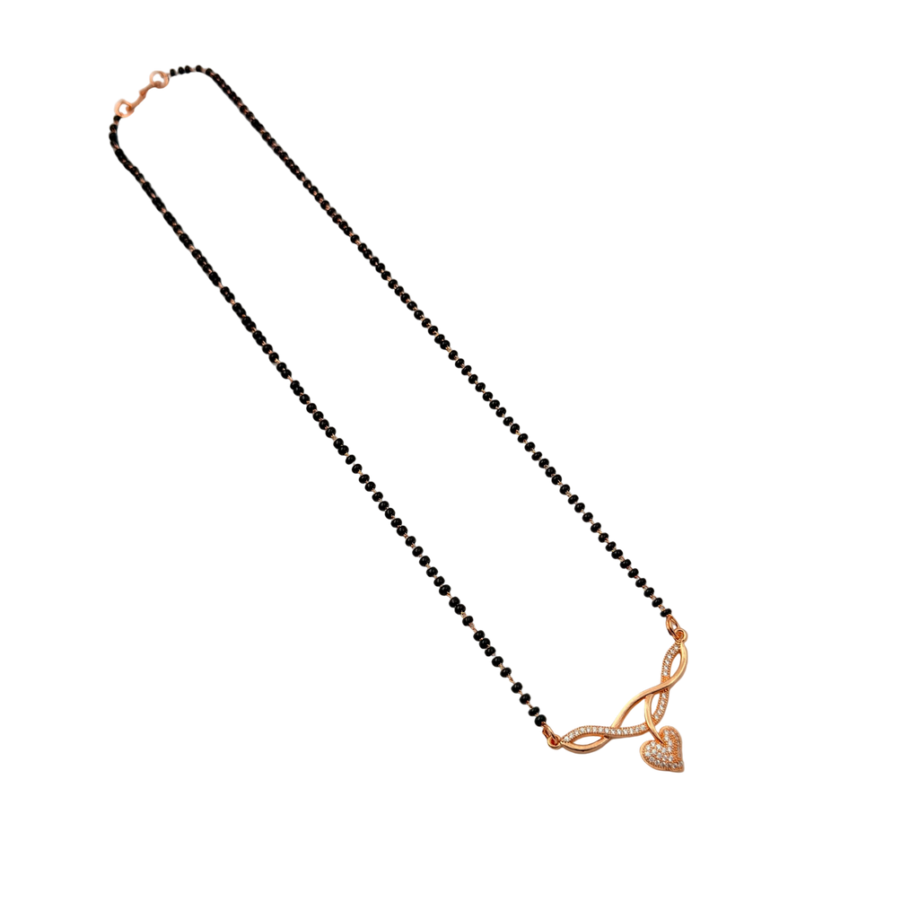 Rose gold-tone heart mangalsutra necklace with CZ stone infinity motif and black bead chain, full flat-lay view
