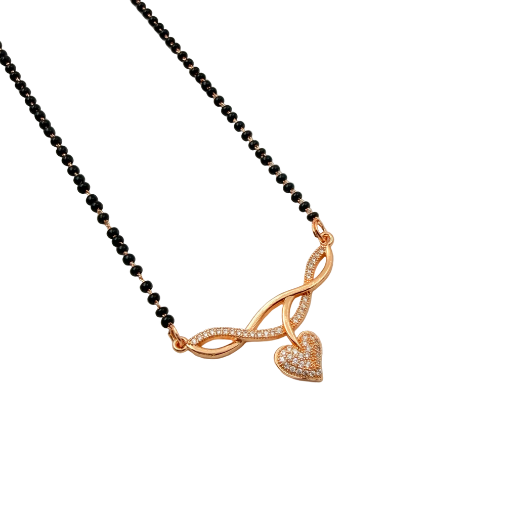 Rose gold-tone heart mangalsutra pendant with CZ stone infinity motif, close-up on black background