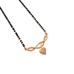 Rose gold-tone heart mangalsutra pendant with CZ stone infinity motif, close-up on black background
