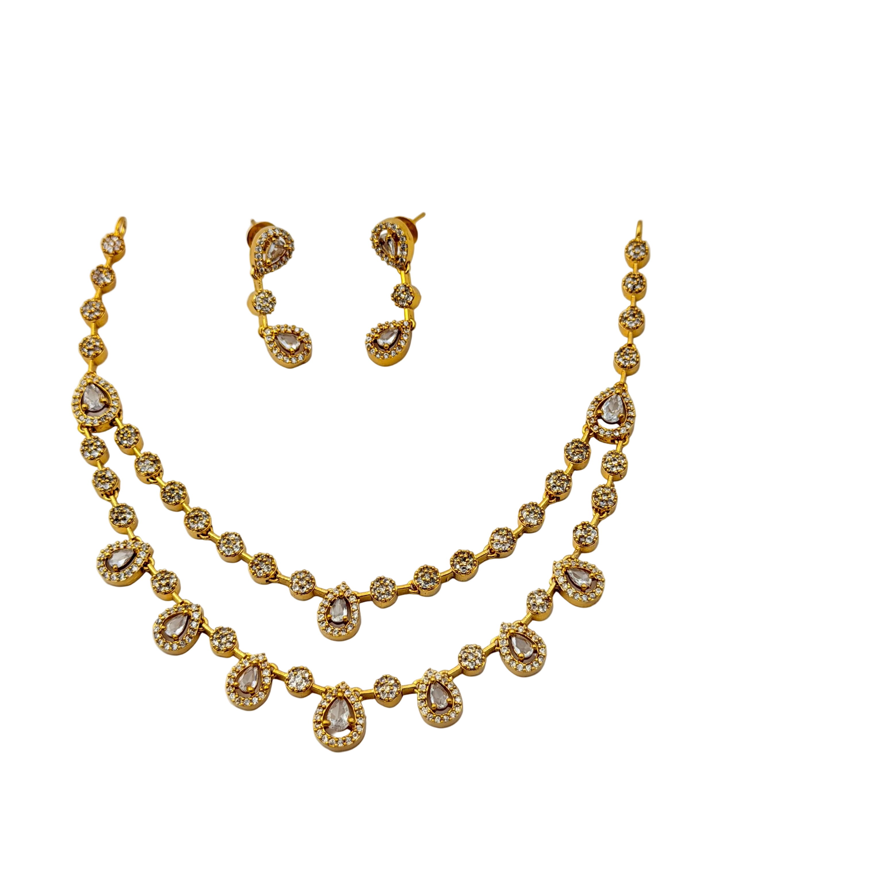 Gold necklace and earrings set on a white background