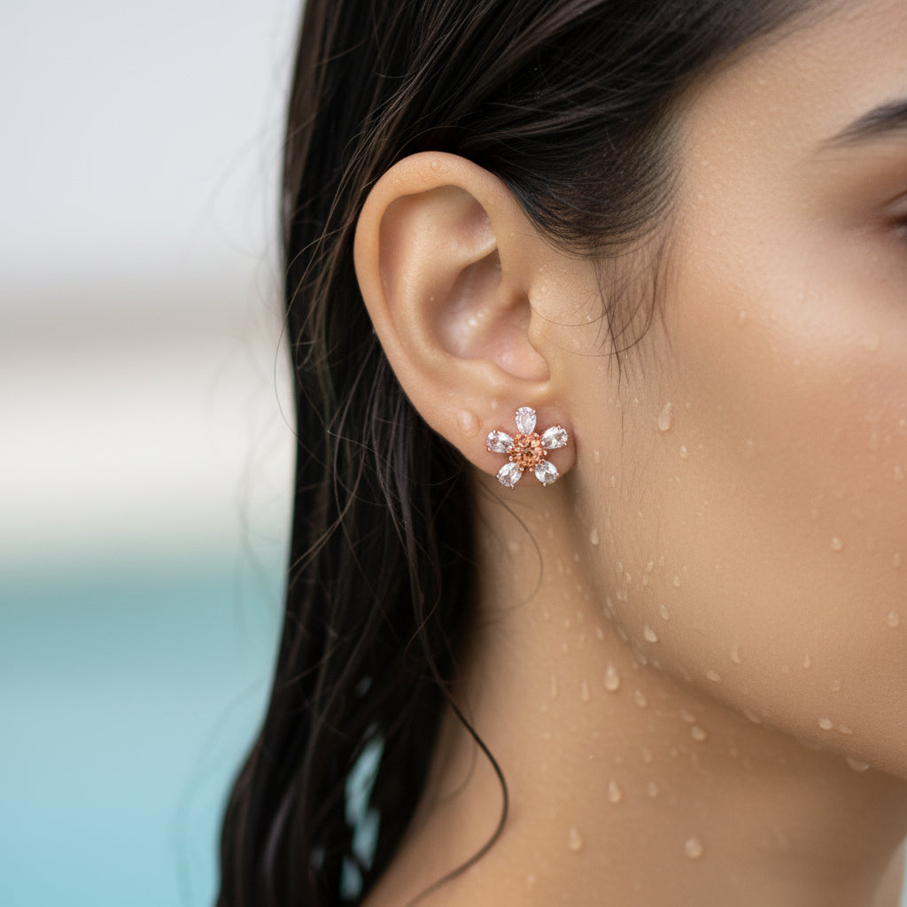 flower-shaped earring on a CZ 