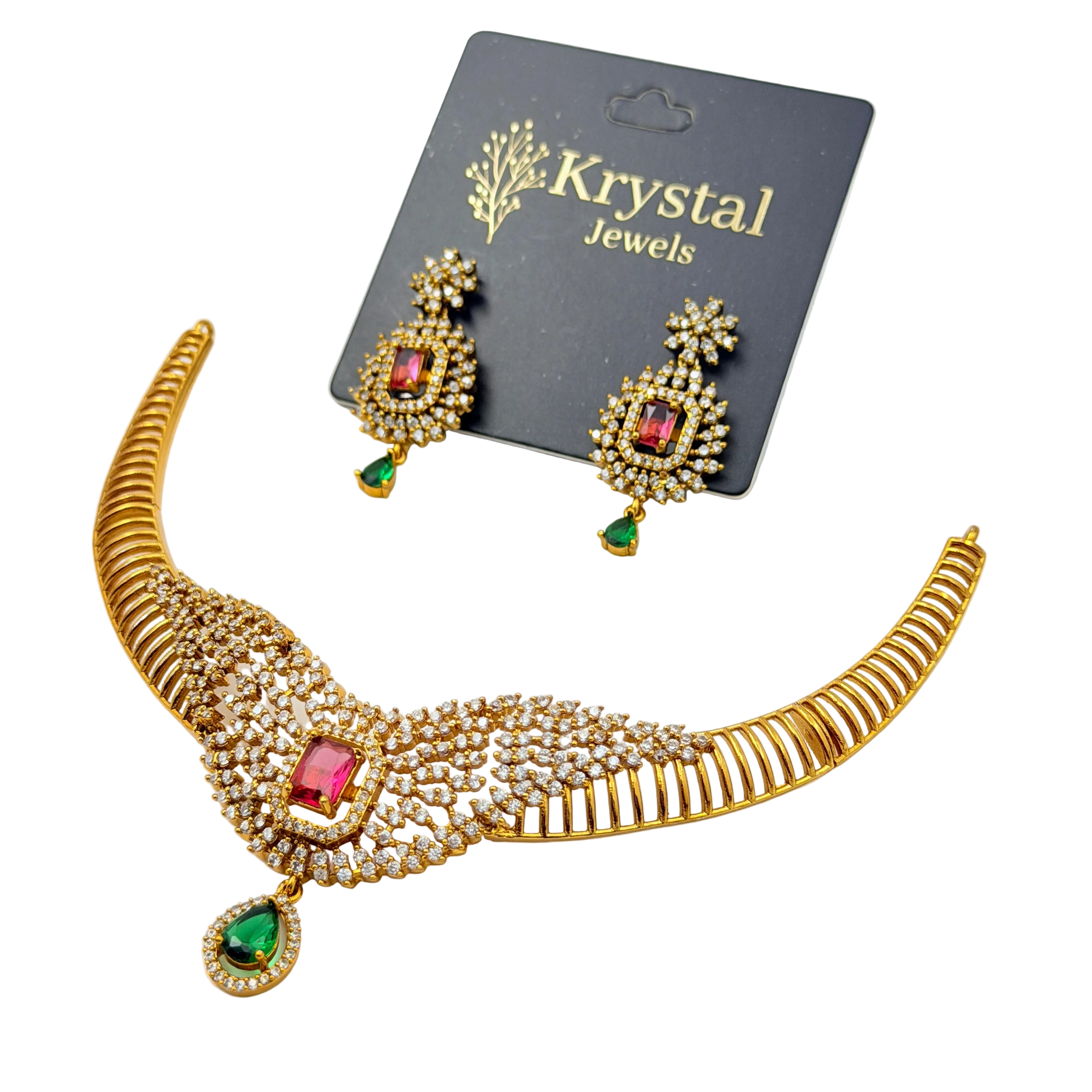 Gold necklace with red and green gemstones on a Krystal Jewels card