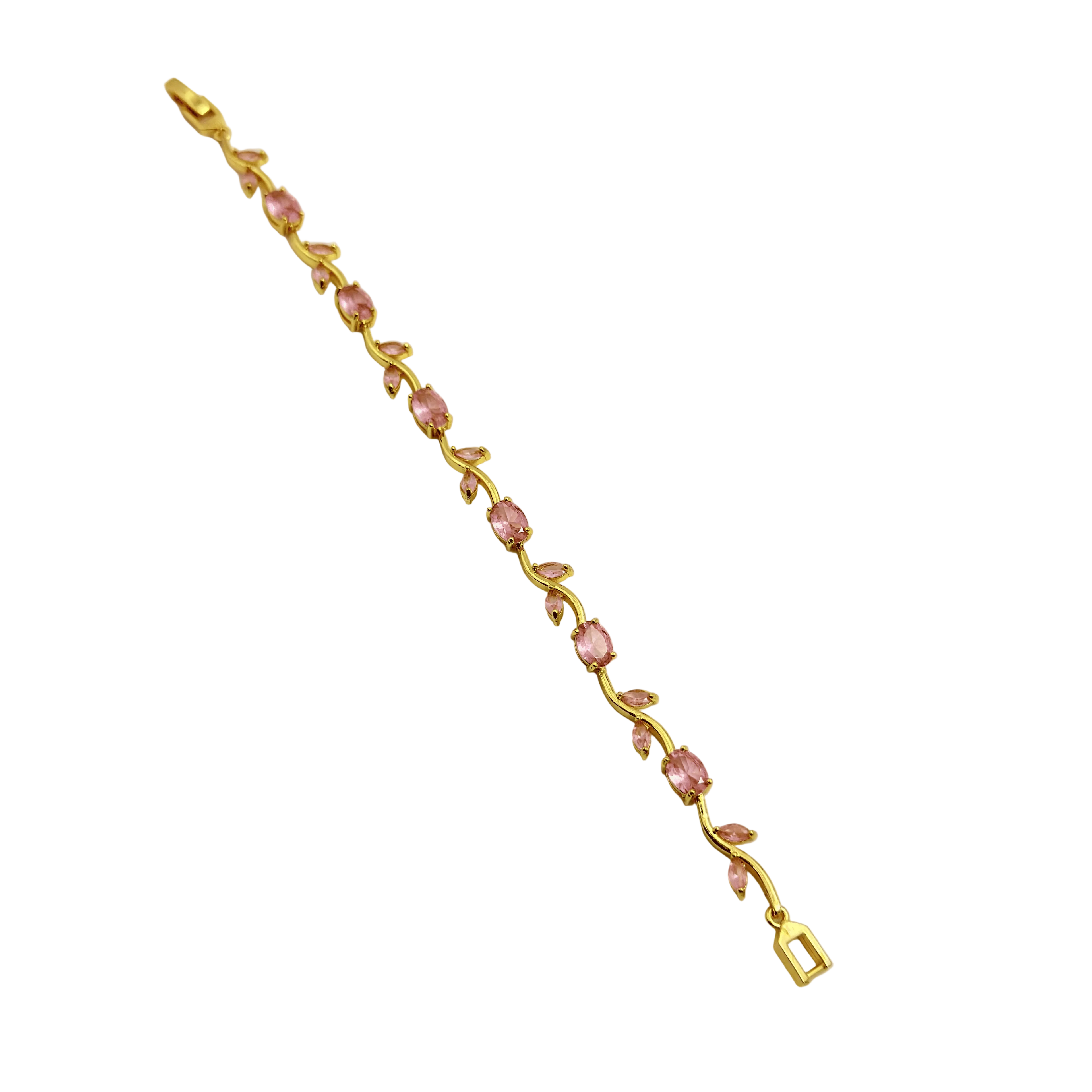 Gold bracelet with pink gemstones on a white background