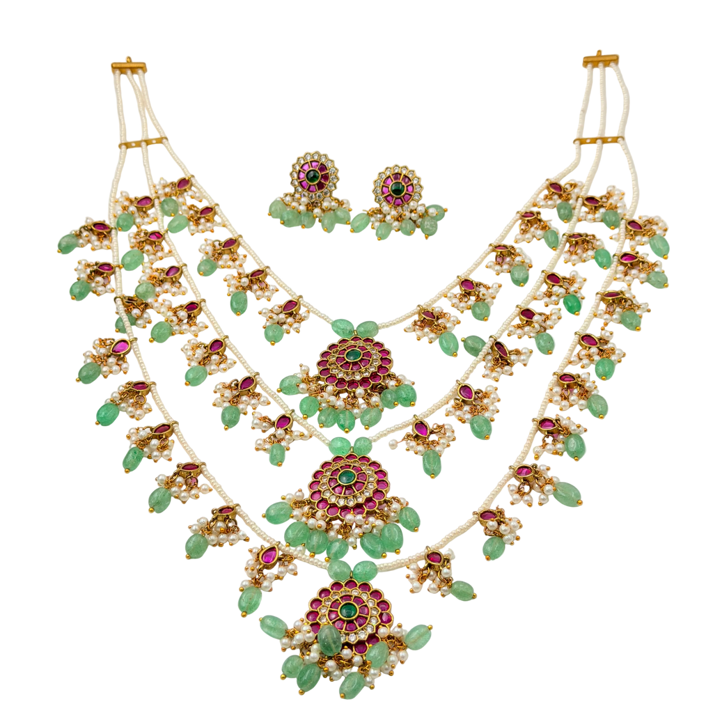 Jewelry set with necklace and earrings on a white background