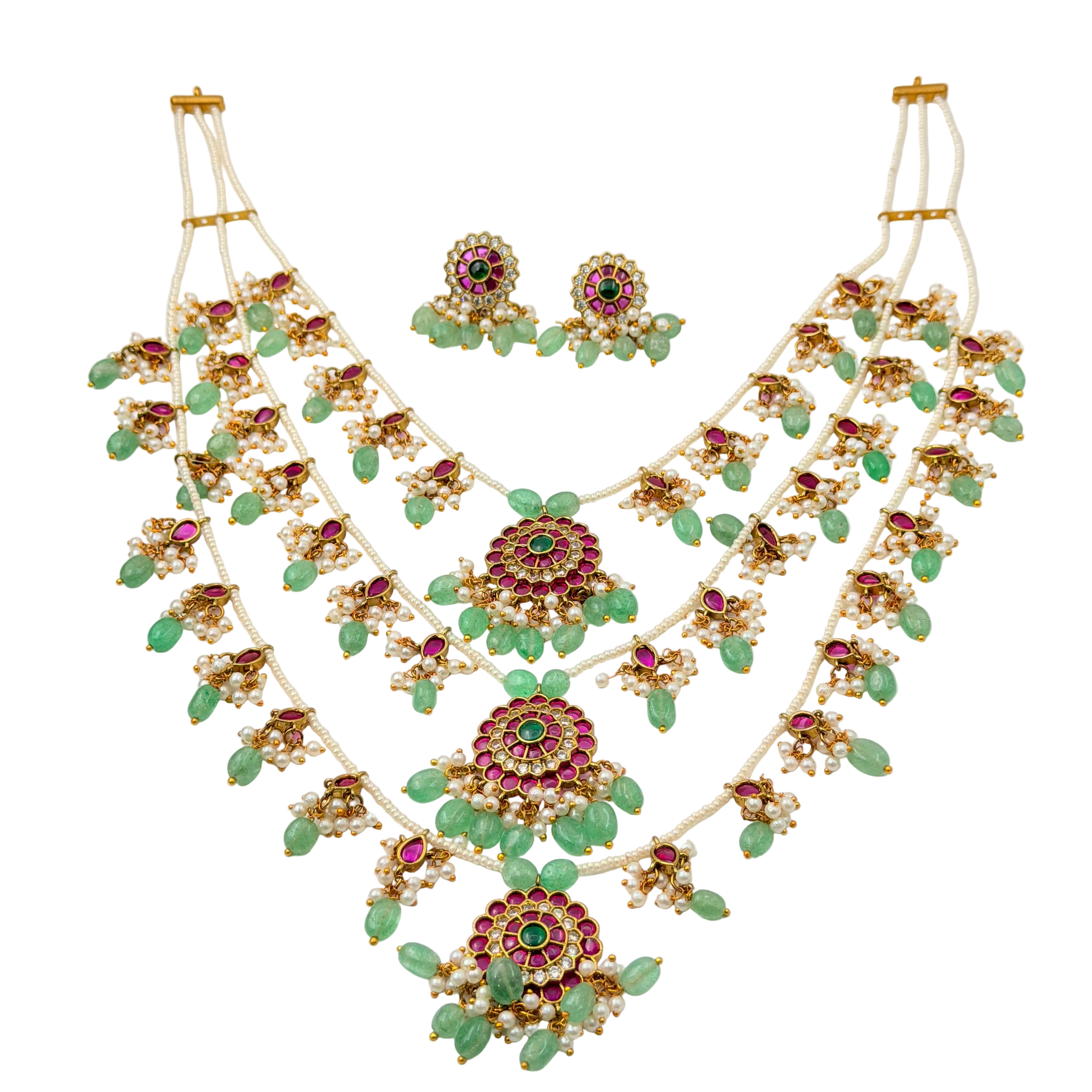 Jewelry set with necklace and earrings on a white background