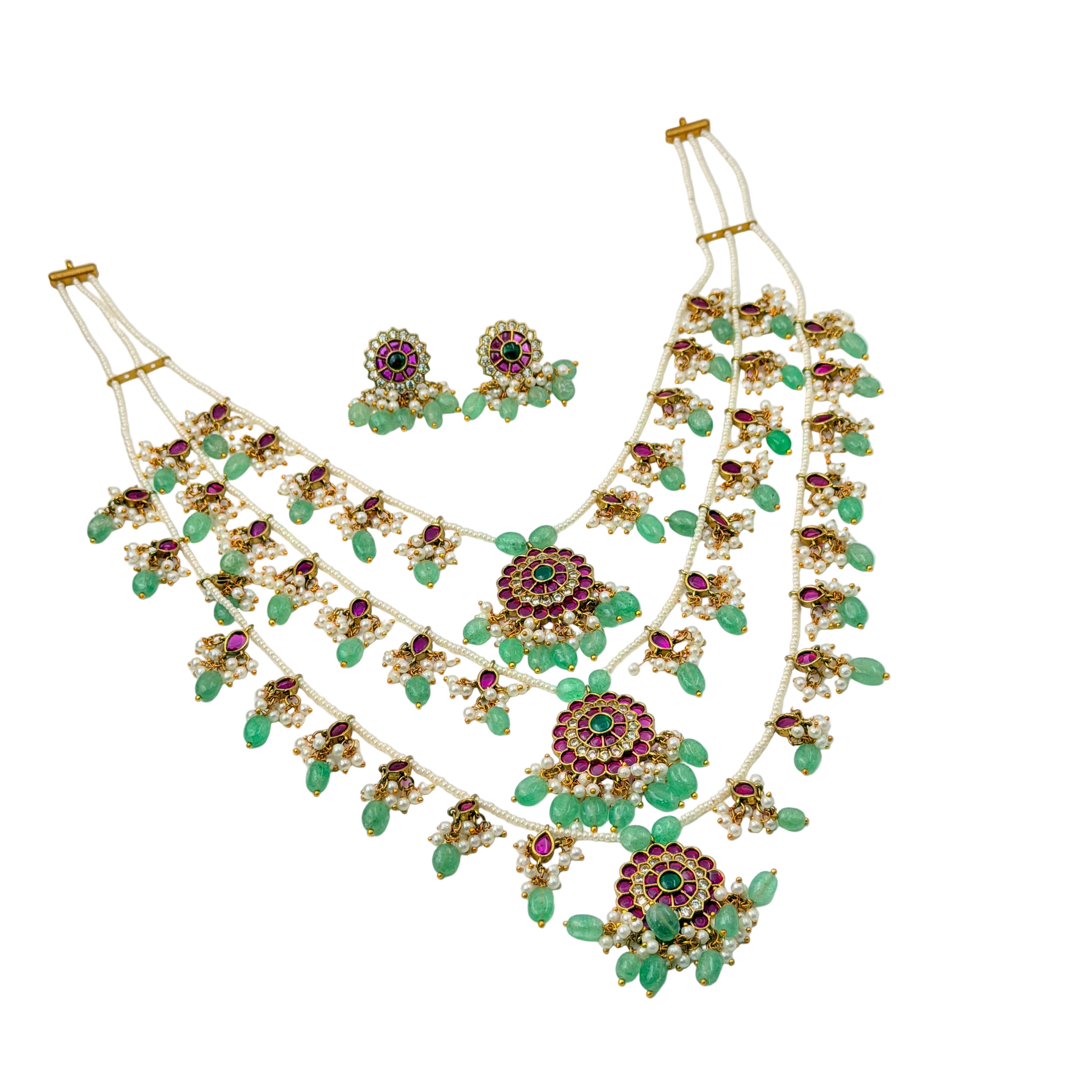 Jewelry set with necklace and earrings on a white background