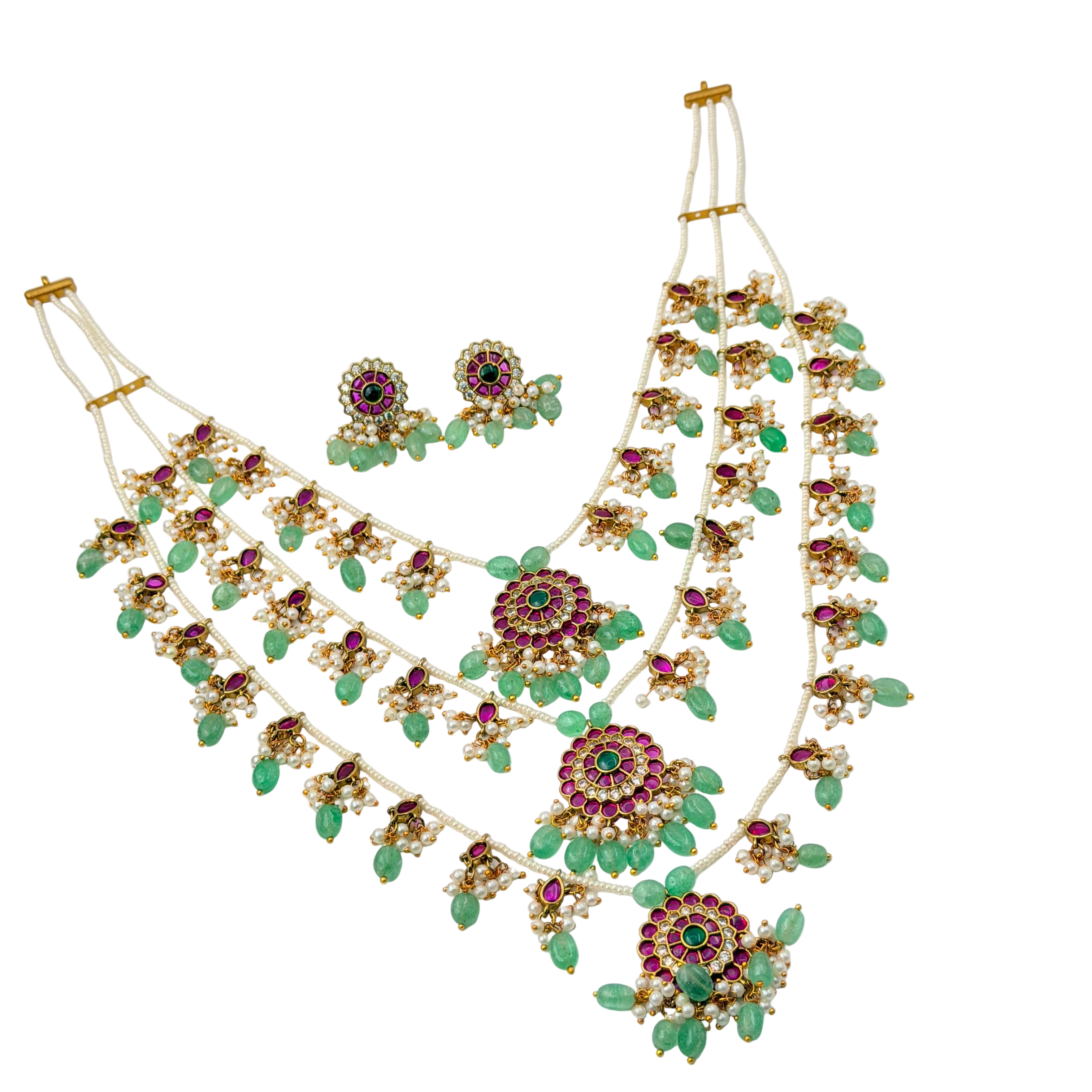 Jewelry set with necklace and earrings on a white background
