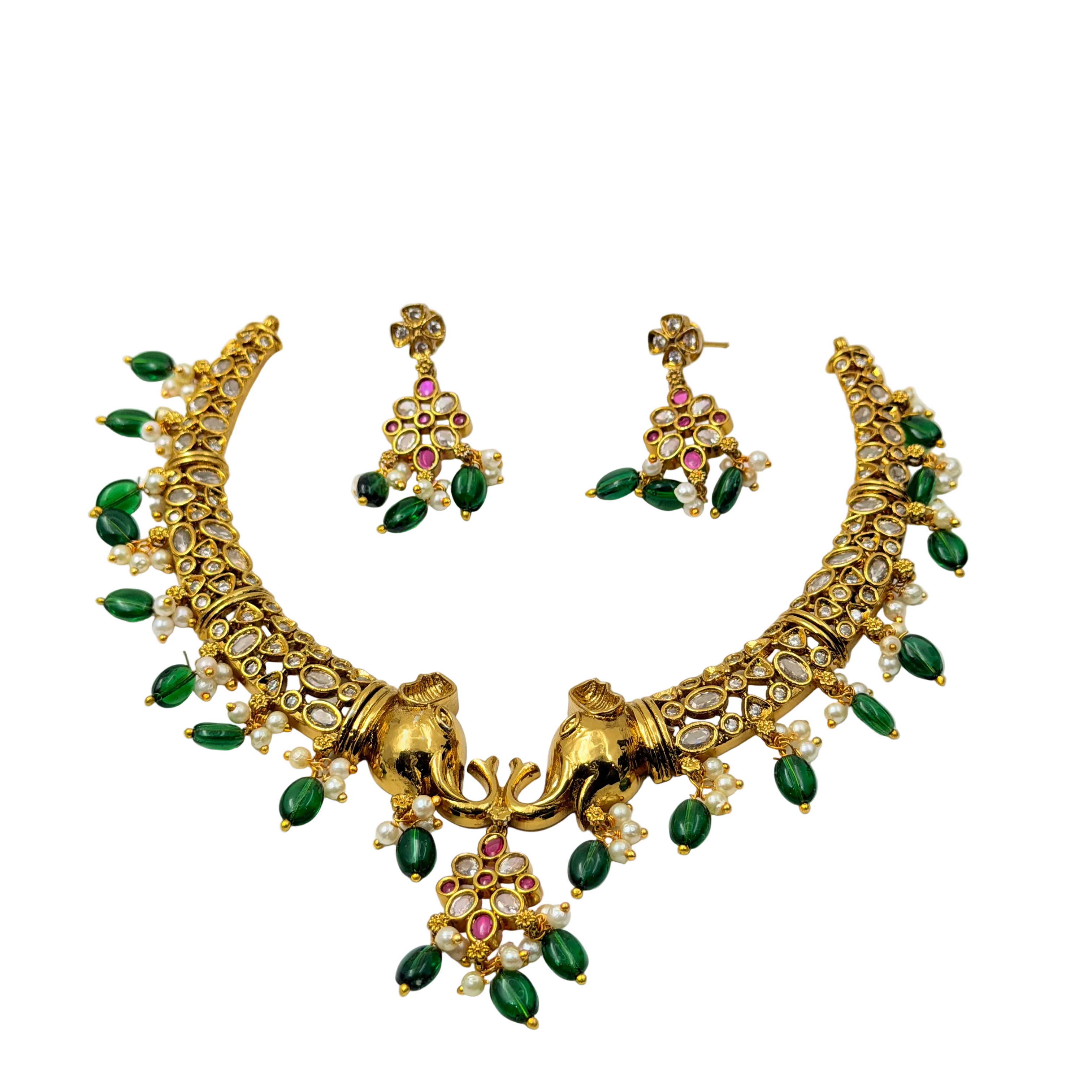 Gold necklace with green and pink stones on a white background