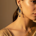 Pair of gold and blue earrings