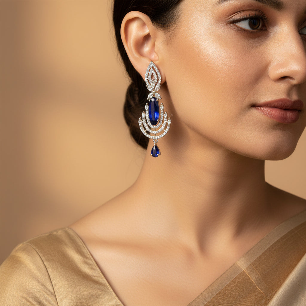 Pair of silver earrings with blue stones 