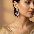 Pair of silver earrings with blue stones 