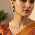Hexagonal earrings with blue gemstones