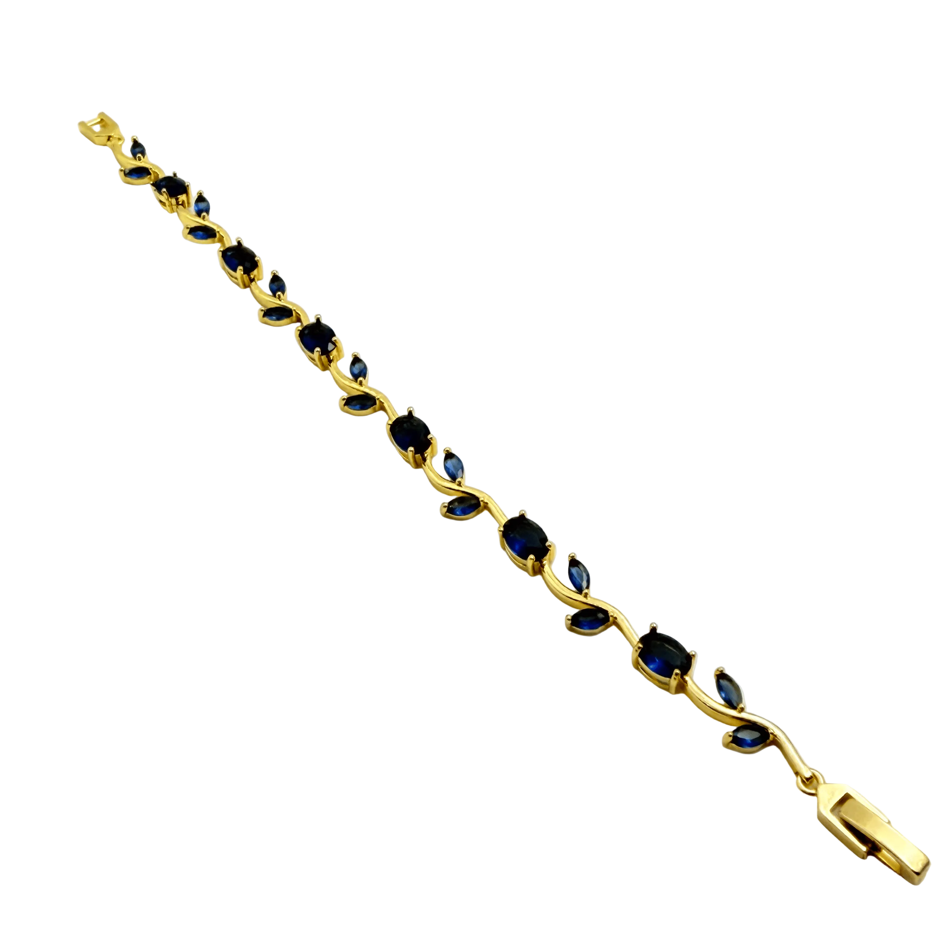 Gold bracelet with blue stones on a white background