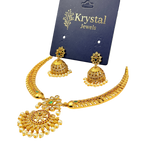 Gold necklace and earrings set on a Krystal Jewels card