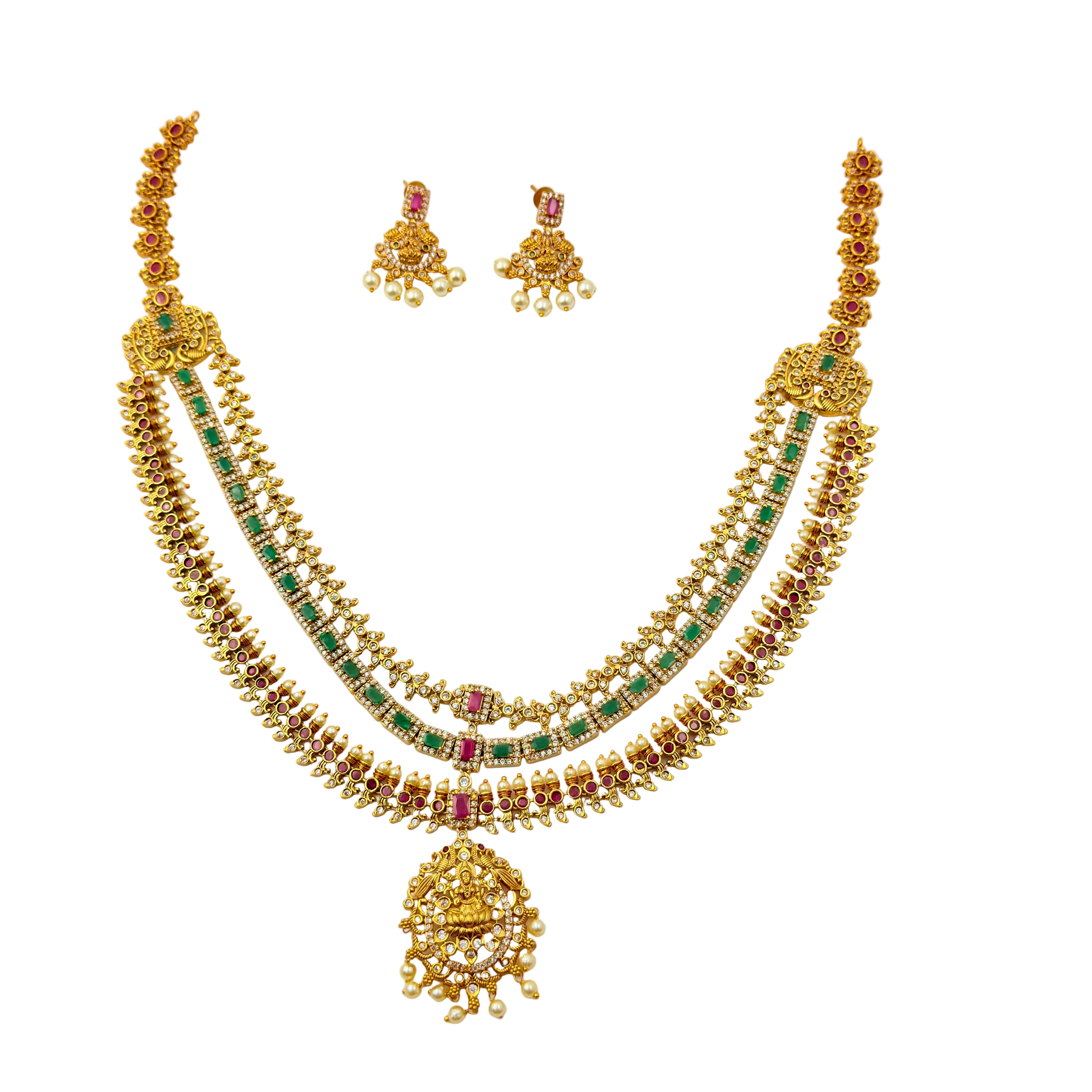 Gold necklace with emeralds and rubies on a white background