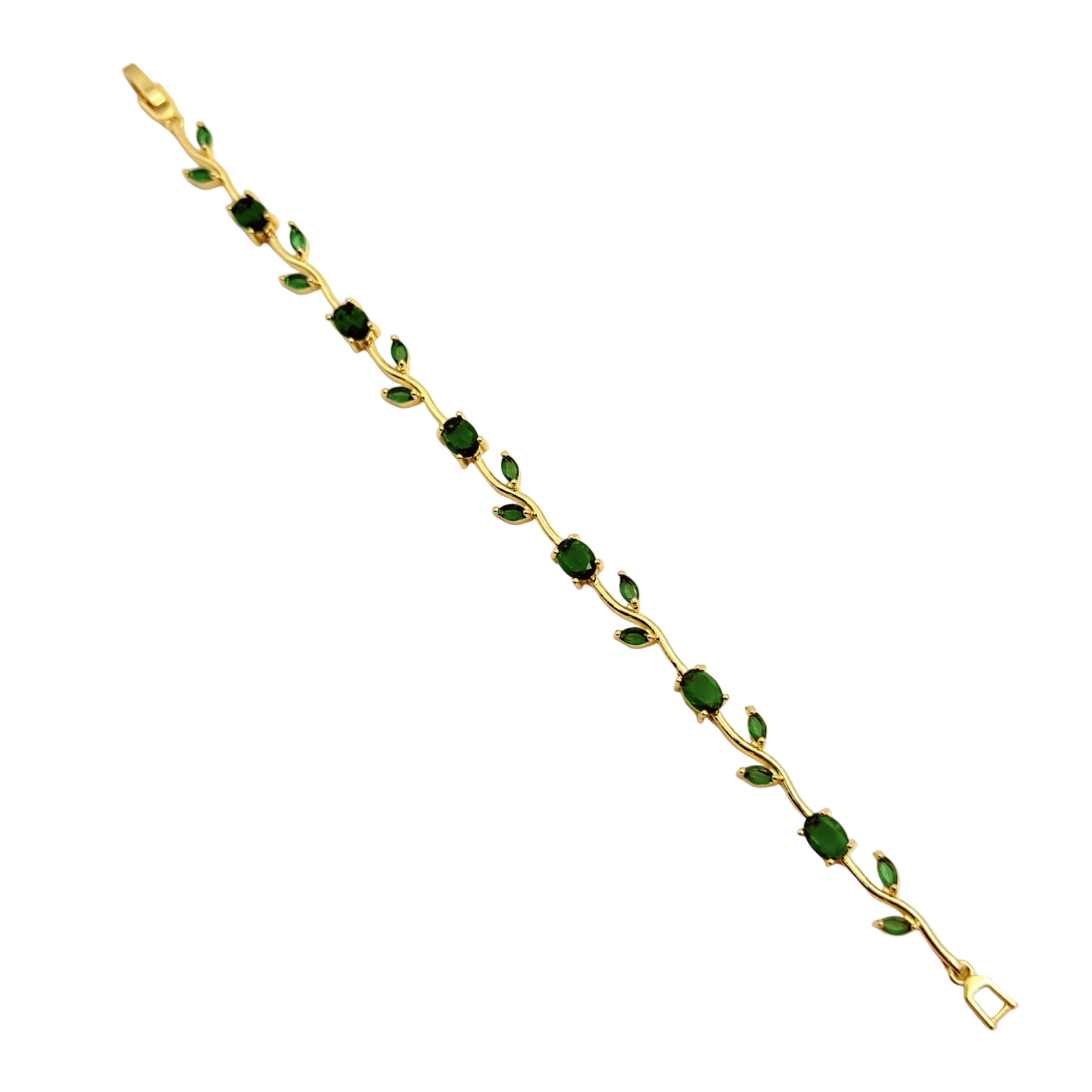 Gold bracelet with green gemstones on a white background